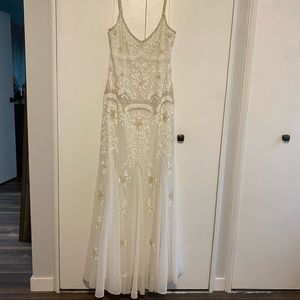 Beaded mermaid style BHLDN Naomi wedding dress